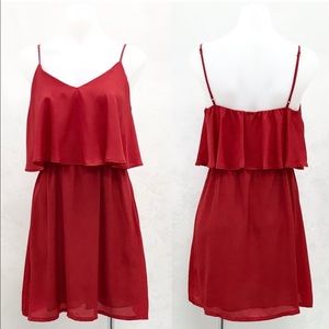 Veronica M. Sleeveless Flounce Dress